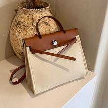 撞色拼接单肩包日系跨境风洋气斜跨包潮包2024年新款女通勤包包