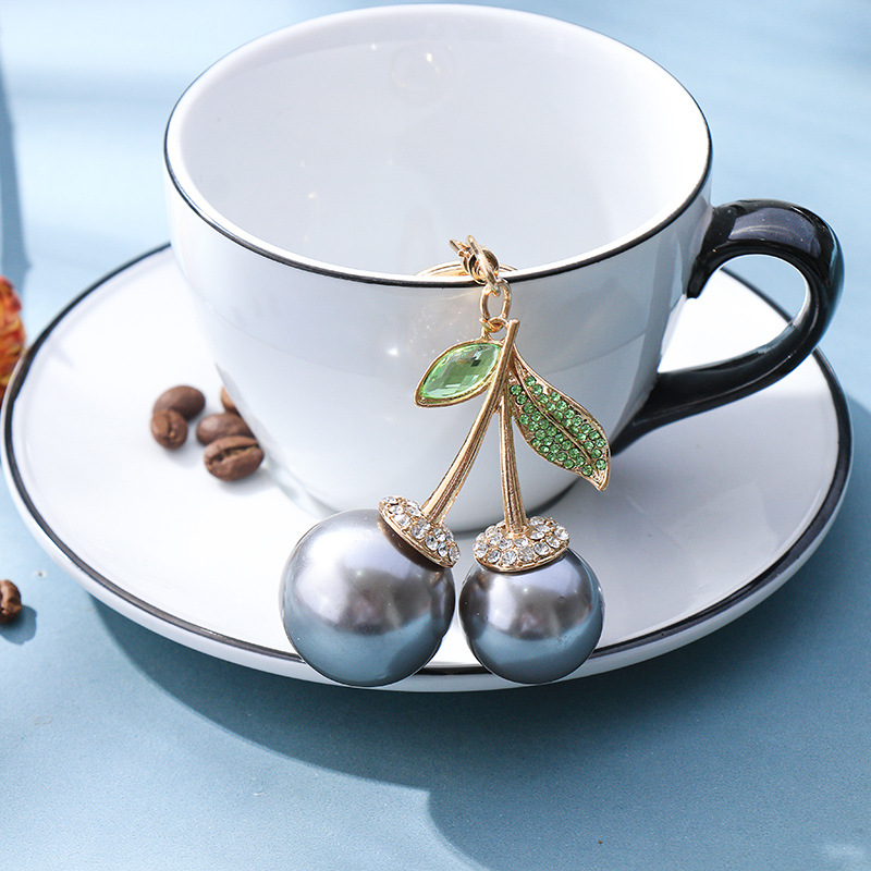 Deli Reba con colgante de bolsa de coche de frutas Llavero de metal coreano creativo transfronterizo