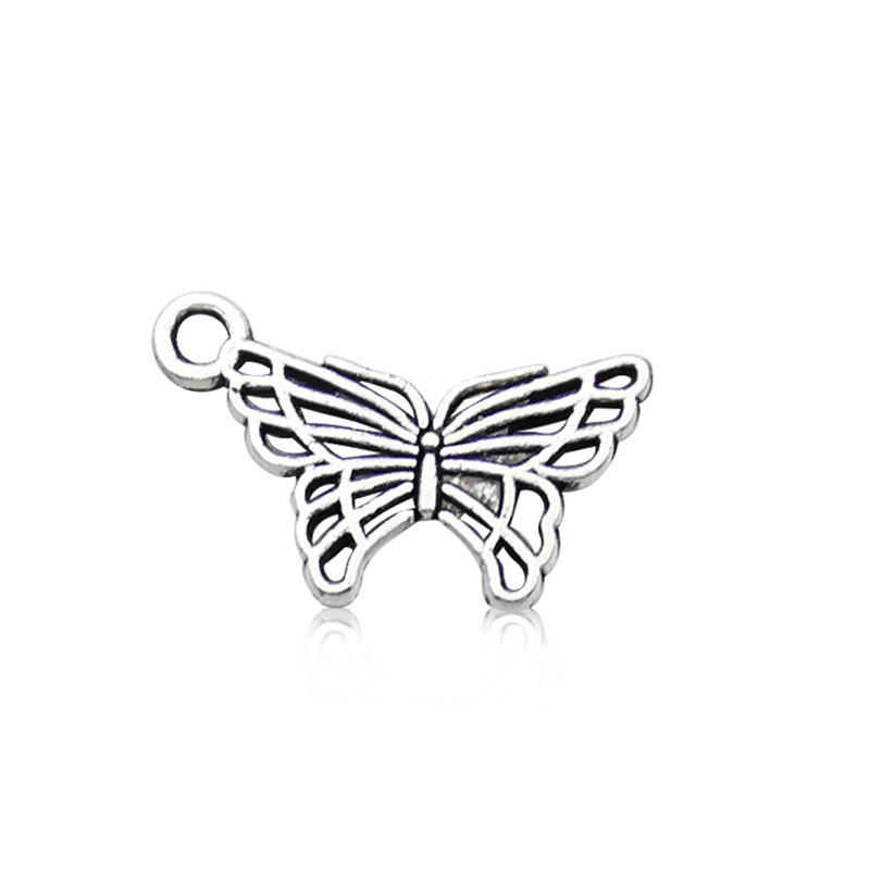 Venta transfronteriza de colgante de aleación de plata Xizanga con forma de mariposa, hecho a mano, para collar, pulsera, accesorio de joyería, venta al por mayor.