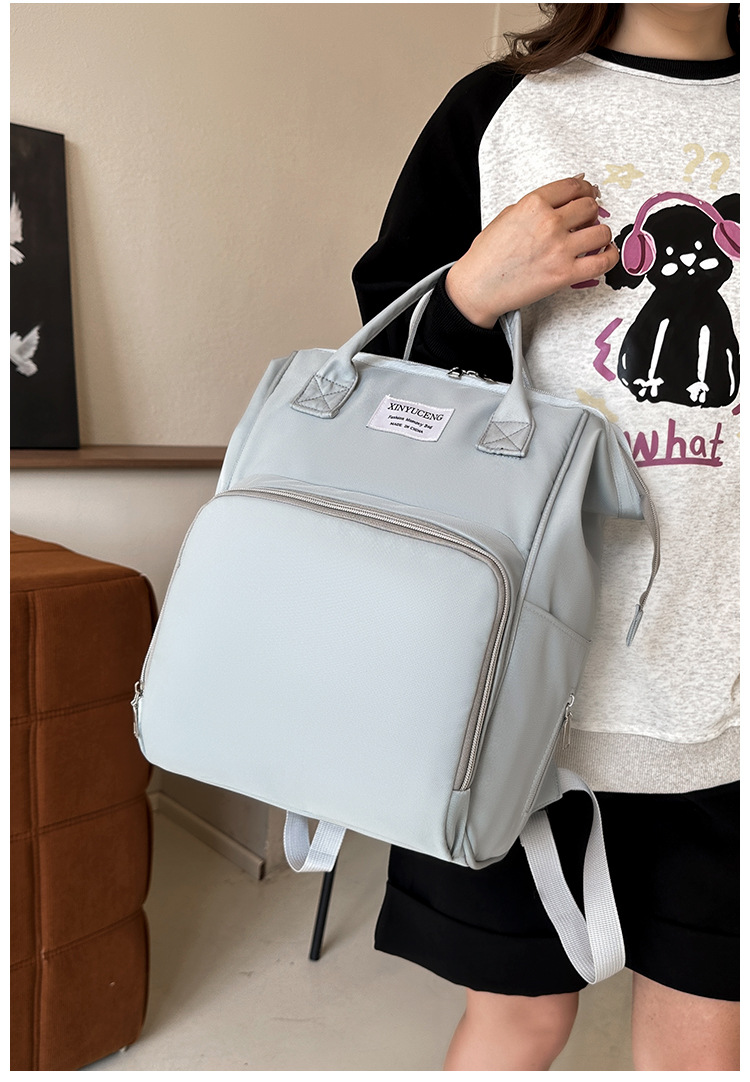 Solid-color lightweight mom bag, a backpack for taking kids out, multi-functional large-capacity mother and baby bag for girls undefined