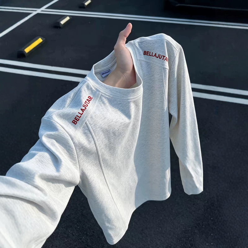 Gray deconstructed embroidered long-sleeve T-shirt for men, stylish and sophisticated, with a retro American aesthetic, perfect as an inner layer Gray deconstructed embroidered long-sleeve T-shirt for men, stylish and sophisticated, with a retro American aesthetic, perfect as an inner layer