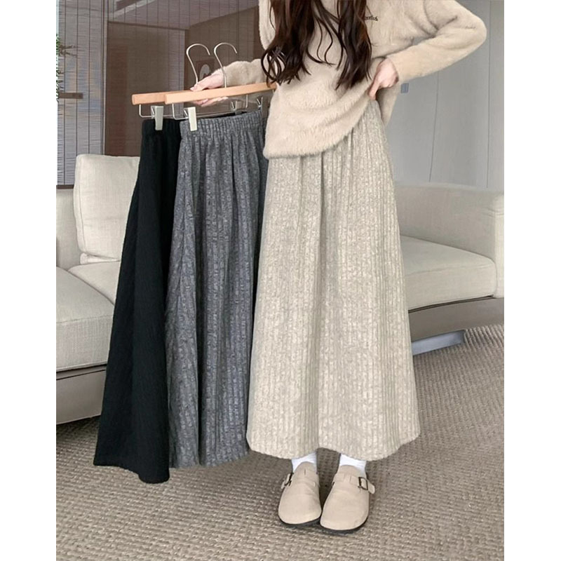 Fleece-Lined Thick Cashmere Midi Skirt for Women, Autumn and Winter 2025 New High-Waisted A-Line Skirt with a Large Hem Fleece-Lined Thick Cashmere Midi Skirt for Women, Autumn and Winter 2025 New High-Waisted A-Line Skirt with a Large Hem