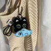 Синий, чёрный кот с рыбой