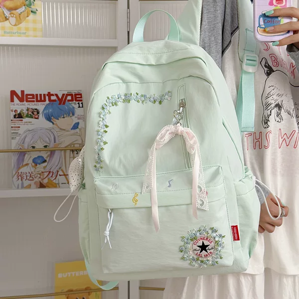 Mint green solid color simple and versatile backpack for junior high school girls, suitable for high school students, stylish and perfect for travel