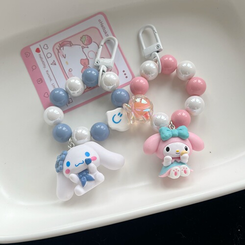 New cream beaded cartoon big-eared dog keychain cute doll short mobile phone chain same mobile phone hanging