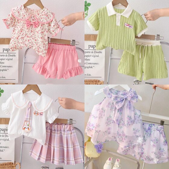 Girls' college style 2025 summer round neck short sleeve Korean cartoon short sleeve shorts two-piece children's suit wholesale