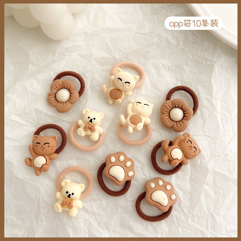 La banda de goma marrón leche simple y Linda para las mujeres no duele la banda del pelo de la cuerda del pelo de la cola de caballo del tamaño pequeño para las mujeres