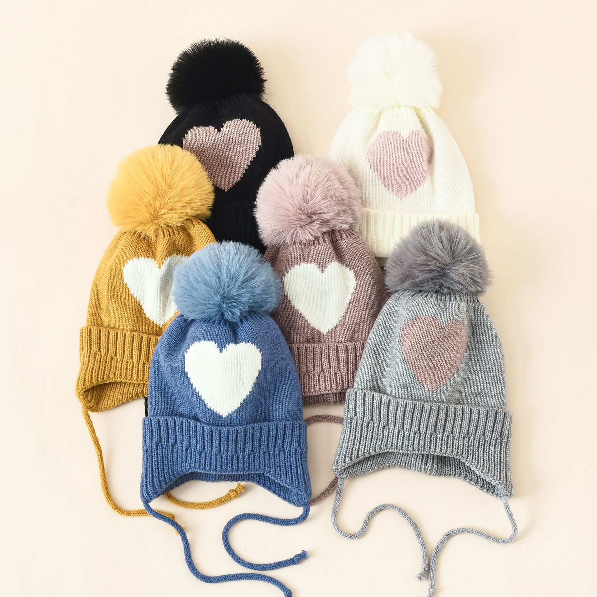 Estilo coreano otoño e invierno cálido sombrero de lana de amor para niños Bola de piel protección para los oídos otoño e invierno al aire libre a prueba de frío sombrero de punto