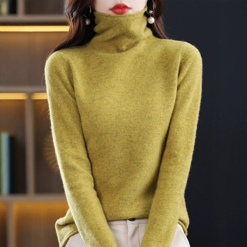 Autumn and winter rolled-hem, ruffled-neck knitted sweater for women, made of pure wool, with a high collar, long sleeves, and a simple, solid color design, perfect as an inner layer or base layer Autumn and winter rolled-hem, ruffled-neck knitted sweater for women, made of pure wool, with a high collar, long sleeves, and a simple, solid color design, perfect as an inner layer or base layer