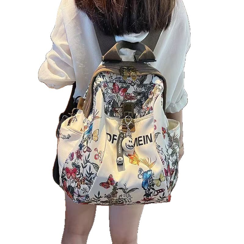 Perezoso viento alto valor de la cara explosivo estilo de moda extranjero anti-sucio damas mochila de viento 2025 mochila de viaje