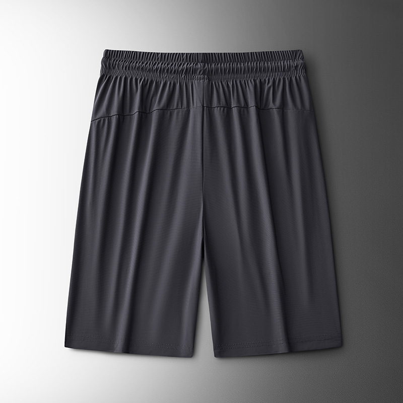 2025 nuevo verano más el tamaño de los pantalones deportivos de nailon pantalones de cinco puntos para hombres pantalones cortos de seda de hielo de color sólido de secado rápido fábrica al por mayor