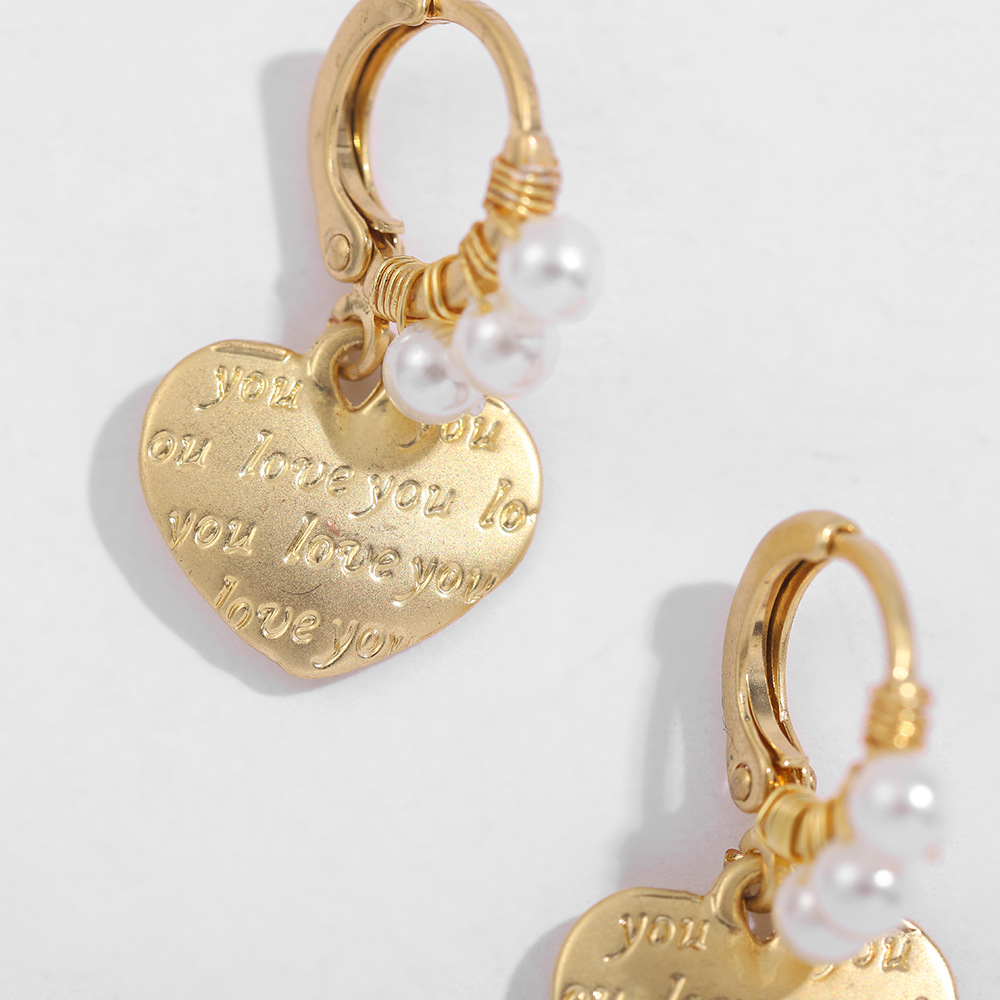 Boucles D'oreilles D'amour Simples En Métal Sauvage display picture 4