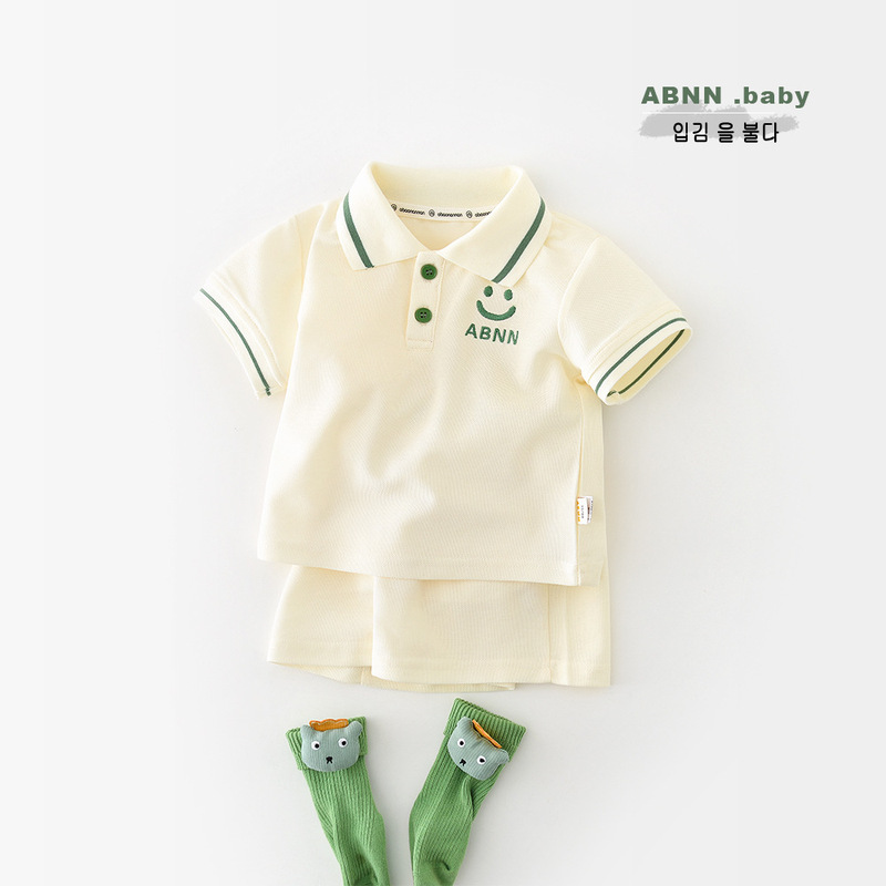 Yueji summer children's cartoon smiling face short sleeve suit baby polo collar Korean shorts two-piece 52032