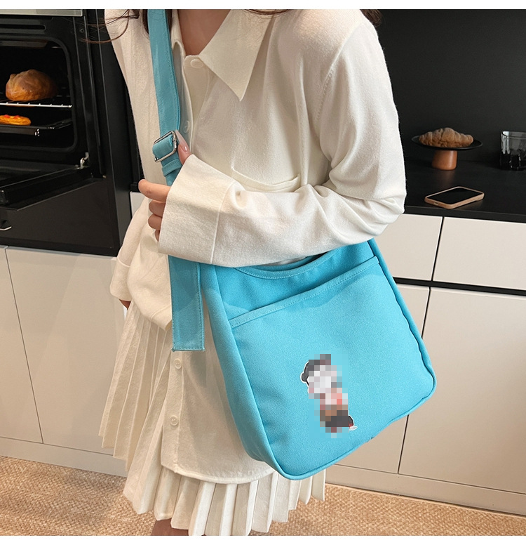 2025 nuevo bolso de lona bolso de hombro de gran capacidad para mujer bolso casual de todo fósforo para estudiantes en clase bolso de viaje