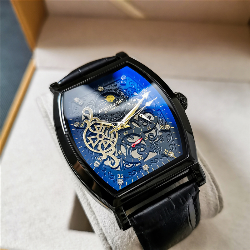 Barril de vino Reloj mecánico automático hueco-hacia fuera transparente azul claro vidrio luminoso de cuero impermeable de los hombres hebilla de mariposa Mesa multifunción
