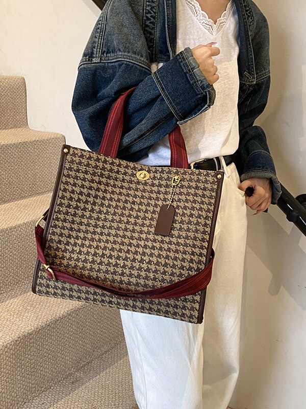 Bolso de patrón leopardo para mujeres 2026 nueva moda retro transfronteriza bolsa de viaje bolsa de tela de bloqueo mochila de hombro