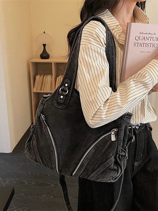 Bolsa de locomotiva de denim 2026 nuevo retro de gran capacidad de textura de lujo ligero bolso de hombro bajo la axila
