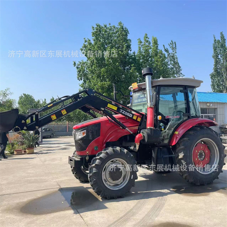 出口热销轮式拖拉机 水旱田两用农用车 大型农用拖拉机加装前铲