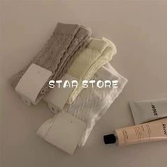 The setting sun's glow seems thick, but it's actually a thin and breathable knee-high sock for women.