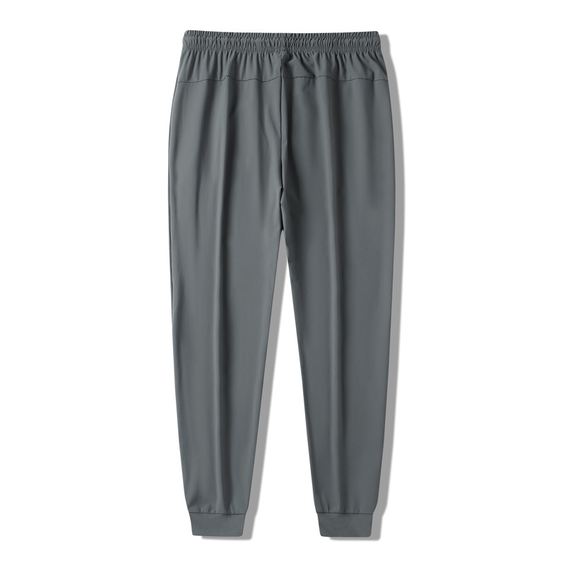 Pantalones de verano de hielo de tamaño grande para hombres pantalones deportivos de barril recto, piernas de ángulo plano sin quemar, secado rápido pantalones casuales al por mayor