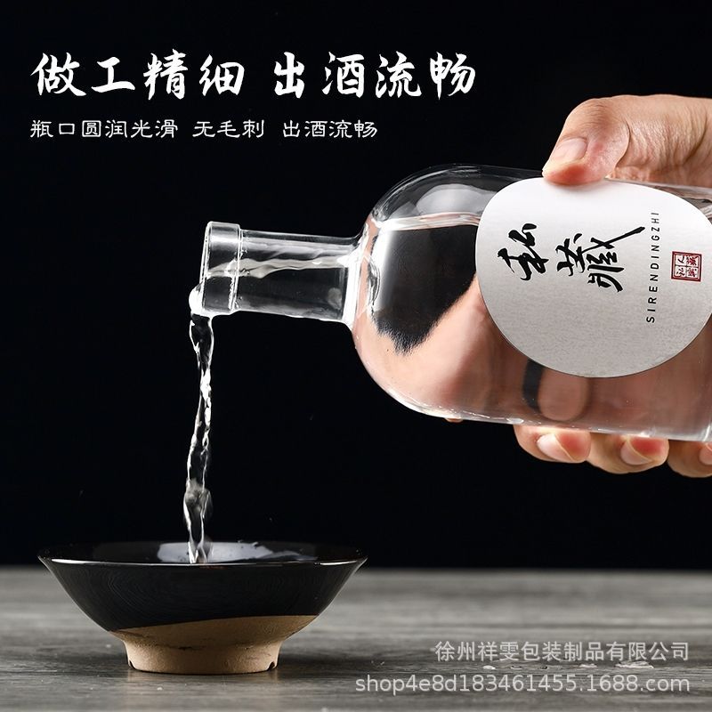 Botella de vino de alta gama al por mayor botella de vino de vidrio especial botella de vino blanco botella de vodka botella de vidrio esmerilado transparente de una libra