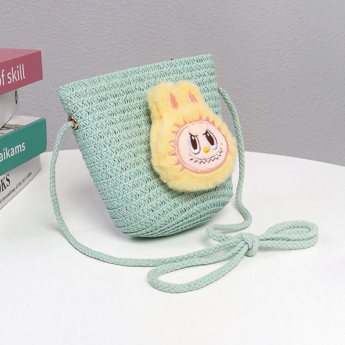 Cartoon adorable mochila de tela de tela de tela infantil hecha a mano creativa tejida de paja transpirable mini niñas mochila de tramo oblicuo