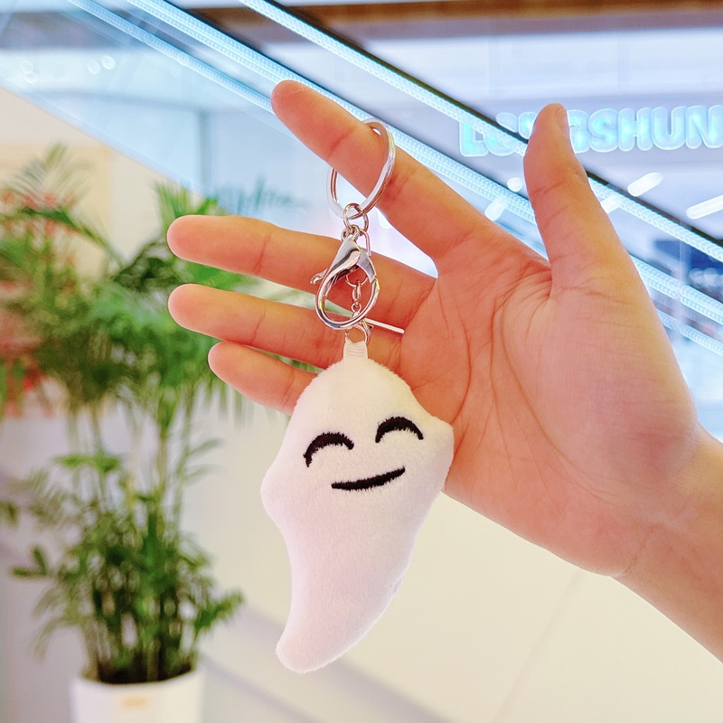 ハロウィーンのかぼちゃのキーホルダーのかばんはかわいいぬいぐるみの幽霊のリュックサックを掛けて子供の機械の露店を飾って卸売りします。|undefined