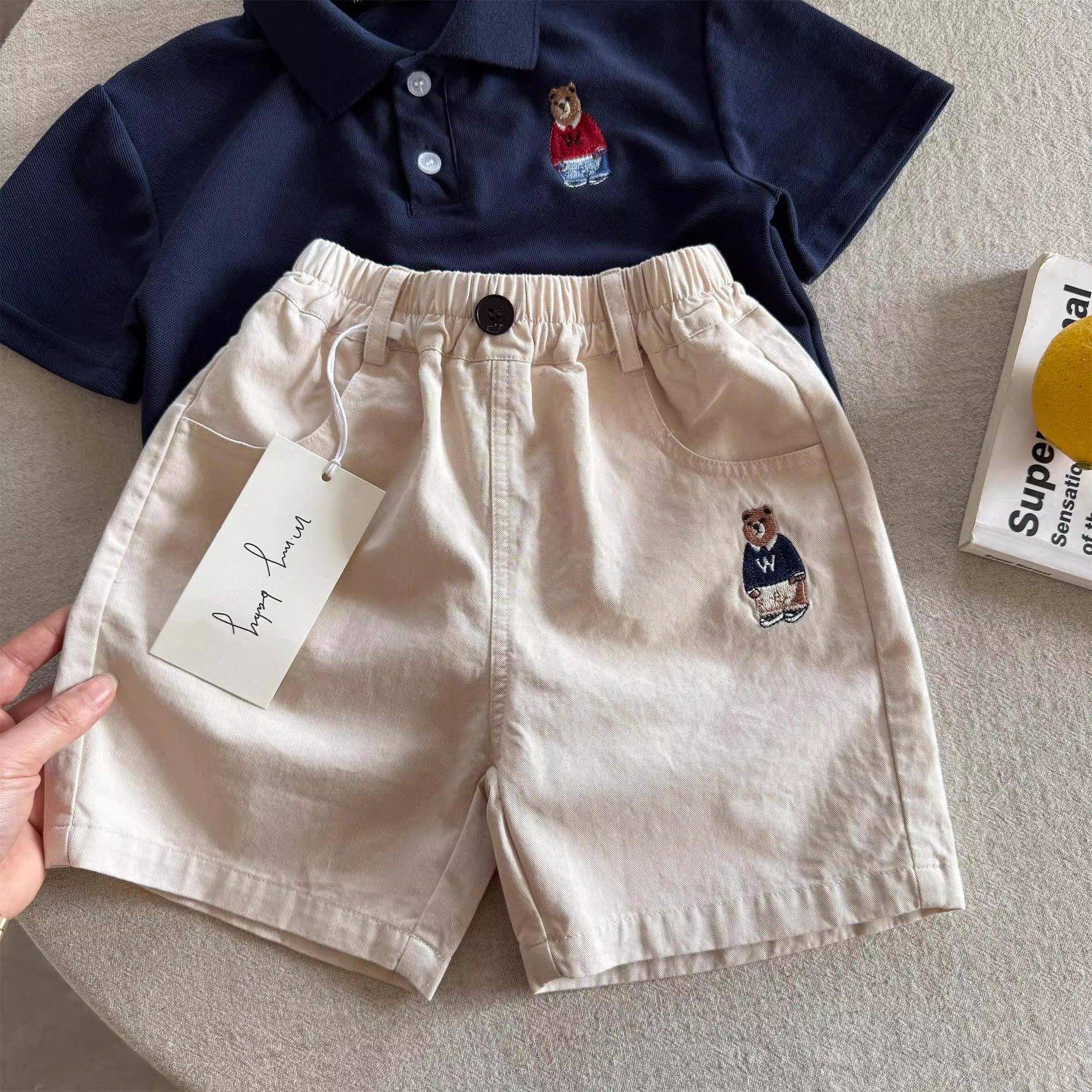 Pantalones cortos para niños 2025 verano, niños y niñas, jeans bordados de oso de la marca de moda japonesa, pantalones casuales de cinco puntos de estilo occidental para bebés image 2
