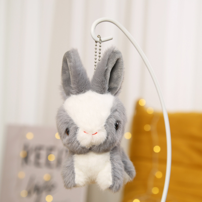 Lindo pequeño conejo blanco colgante de peluche de juguete muñeca de dibujos animados pequeño conejo muñeca de trapo máquina de agarre pequeña bolsa de muñeca adornos