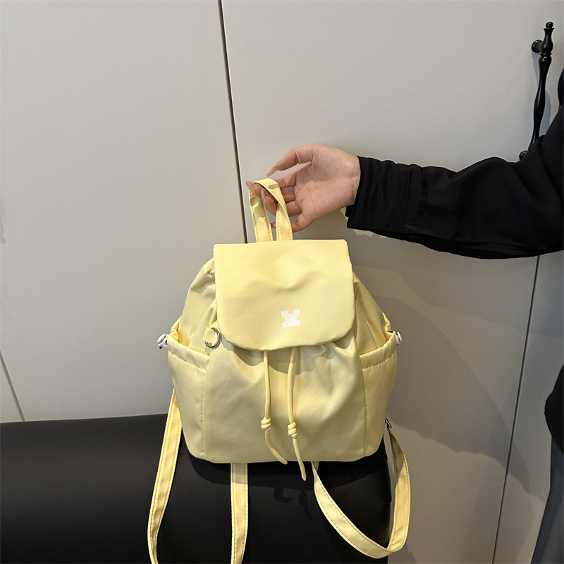 Mochila de gran capacidad con cordón de moda 2025 verano nuevo estilo salvaje ins bolso casual mochila escolar popular de este año