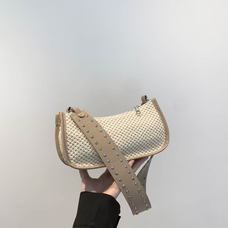 Bolsa trenzada debajo de la axila damas 2024 nuevo estilo ligero de lujo nicho de alta sensación de verano de vacaciones en la playa pastoral bolsa de paja