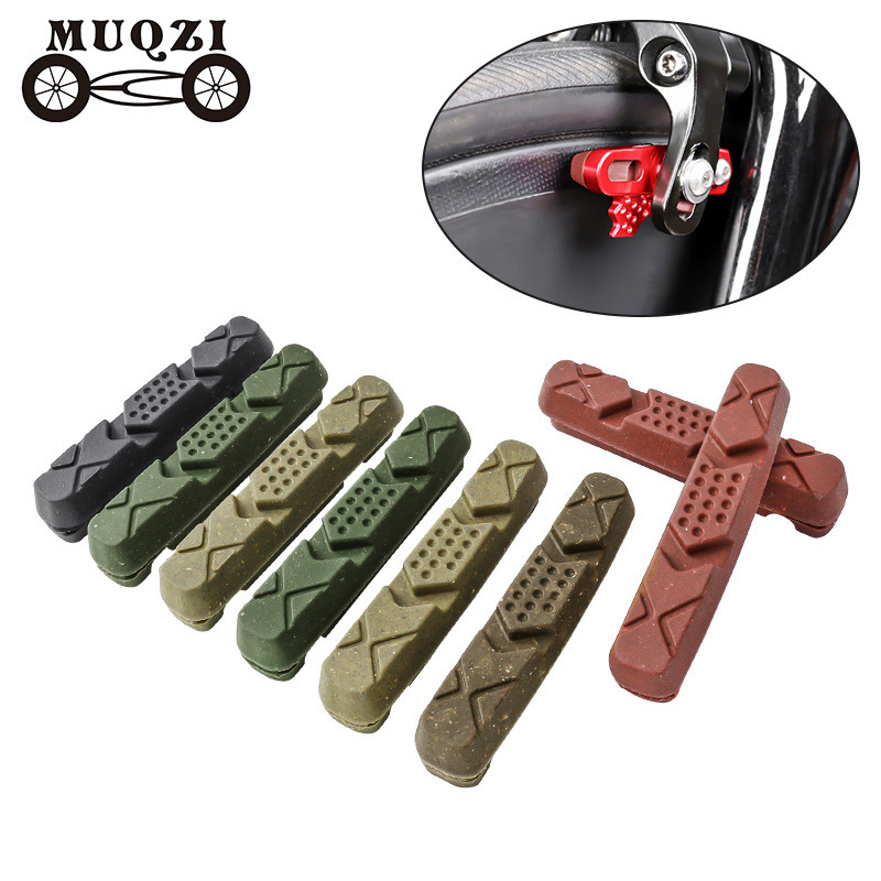MUQZI road folding bicycle, featuring replaceable drawer-style C-clamp brake pads, V-brake pads, and carbon fiber rims MUQZI road folding bicycle, featuring replaceable drawer-style C-clamp brake pads, V-brake pads, and carbon fiber rims