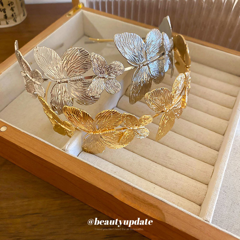 Diadema de metal de mariposa, diadema de presión superior de alta cabeza simple de moda, sentido de alta calidad, personalidad, todo fósforo, nuevos accesorios para el cabello al por mayor