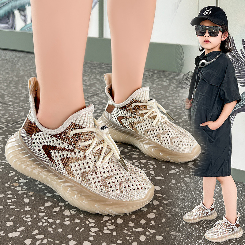 Zapatillas para niños 2025 nuevos zapatos de coco transpirables de tejido volador de verano para niños de mediana edad