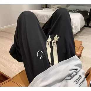 2024 Smiley casual sports pants men's spring and autumn ins junior high school students loose big children slimming ins pants