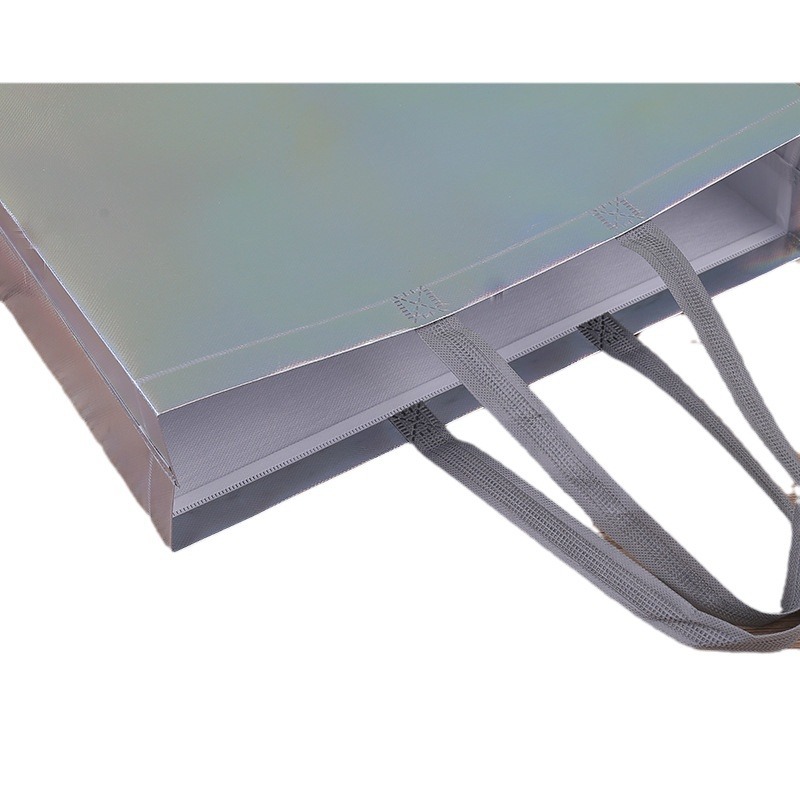 Fabricante spot engrosamiento colorido láser laminada ropa bolso no tejido compras bolsa de regalo de alta gama impresión logotipo