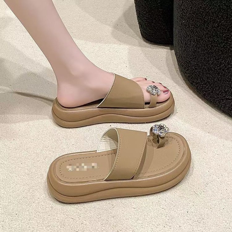 2026 verano nuevo estilo simple de moda de vacaciones de hadas sandalias de playa de viento de dedos de los dedos para usar zapatillas frías para mujeres