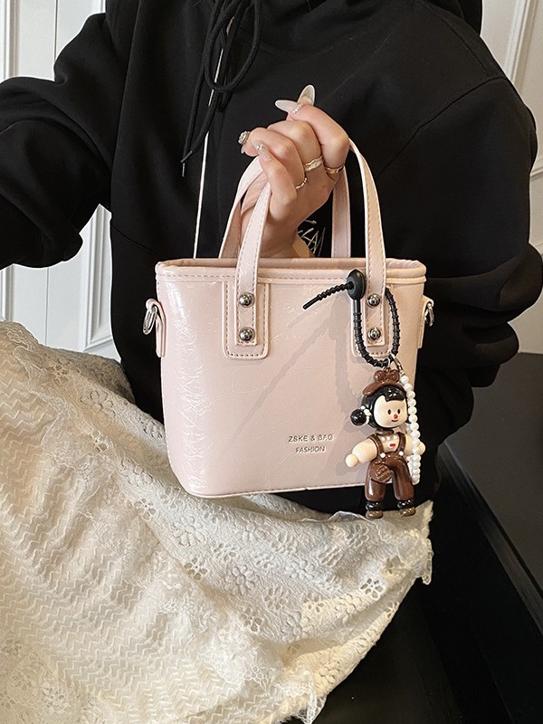 2025 nuevo nicho de moda bolso de cubo de mano para mujeres estilo coreano simple versátil bolso de hombro de moda mochila casual