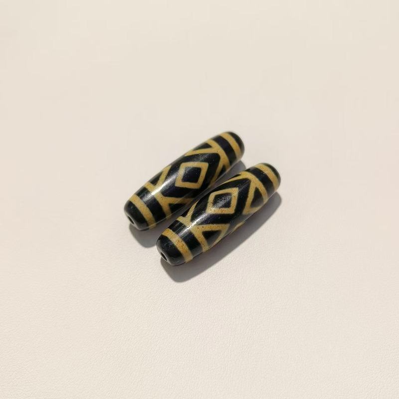 メーカー歯黄包糊九眼12 × 38mm天珠歯黄風化古法包糊瑪瑙天珠【a級】|undefined
