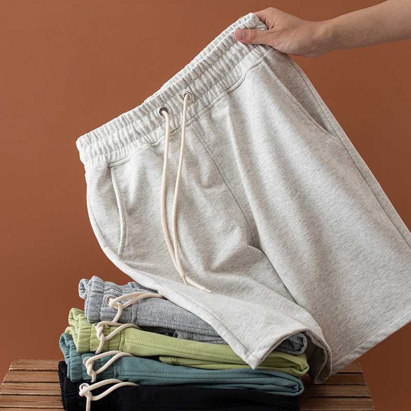 Pantalones cortos de algodón para hombres pantalones cortos para hombres y mujeres Pantalones deportivos casuales Pantalones rectos de moda versátiles pantalones calientes al por mayor