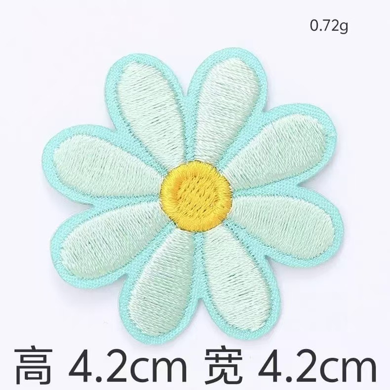 国境を越えたアマゾンの精巧な立体マカロンの小さい花のコンピュータの刺繍の布はDIYの手作業の材料の現物を貼って卸売りします。|undefined