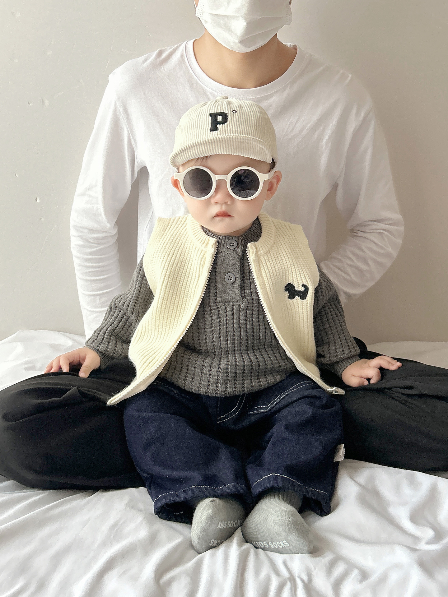 Baby otoño y invierno nuevo chaleco de punto, suéter casual coreano para hombres y mujeres, chaleco de punto caliente para bebés, marea de hombro