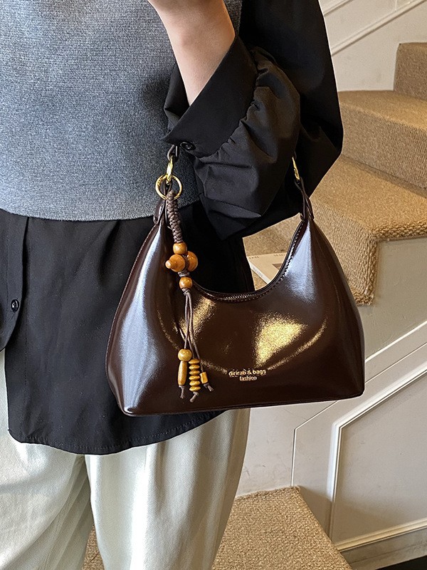 Moda de cera de cuero pulsera bolso de brazalete para mujeres 2026 venta en caliente transfronteriza nueva sensación de lujo ligero bolso de hombro