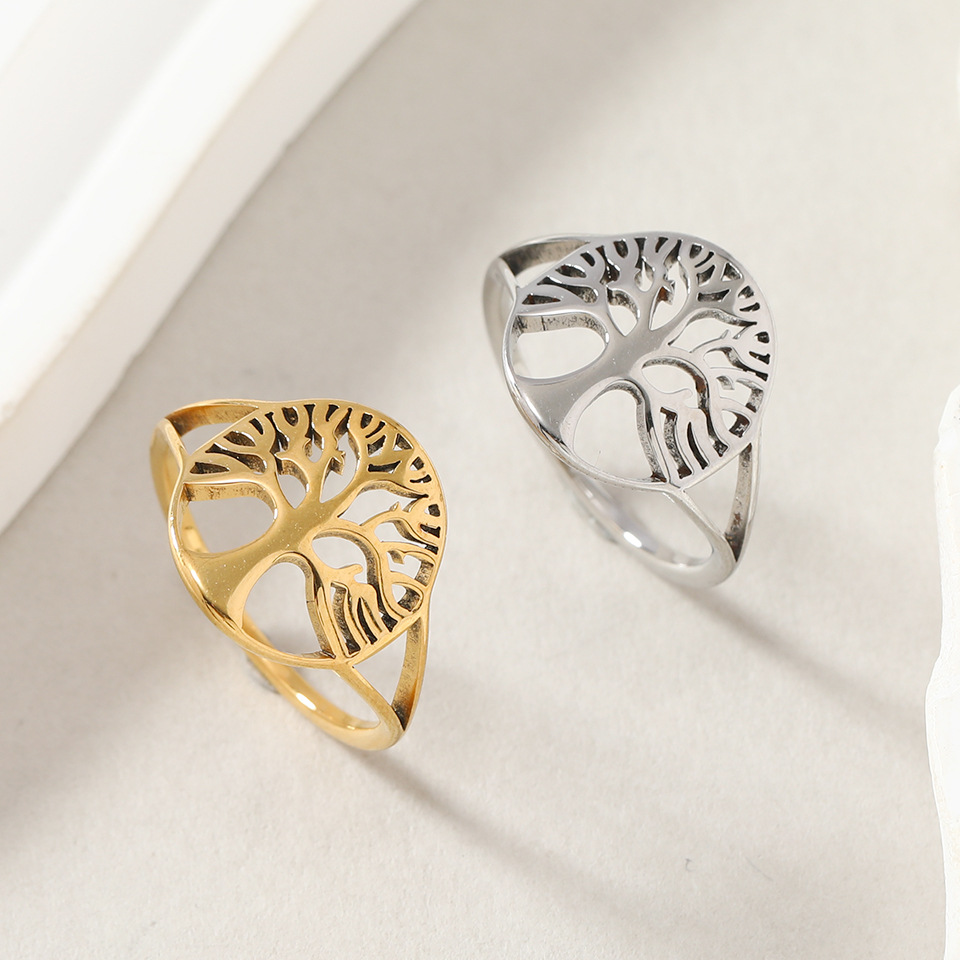 Suministro transfronterizo europeo y americano anillo de acero de titanio personalidad creativa hueco vida árbol pareja anillo de moda joyería fábrica image 3