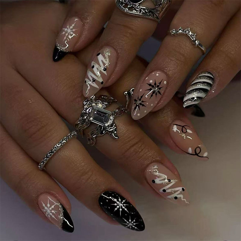 Medium almond-shaped Christmas manicure, black French nails with glitter, Christmas tree, snowflake, and stripe designs, 24-piece set of fake nails Medium almond-shaped Christmas manicure, black French nails with glitter, Christmas tree, snowflake, and stripe designs, 24-piece set of fake nails