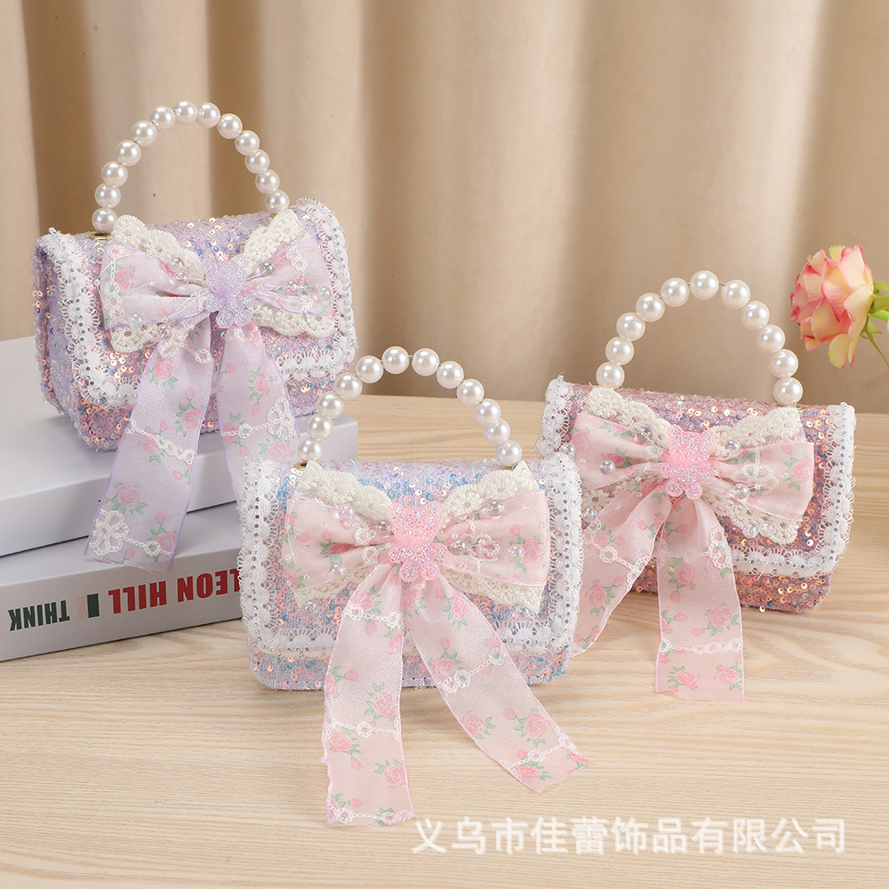 Bolsos para niñas, modernos bolsos cruzados estilo Chanel para niñas pequeñas, elegantes bolsos con lazo de perlas para niñas pequeñas, impermeables.
