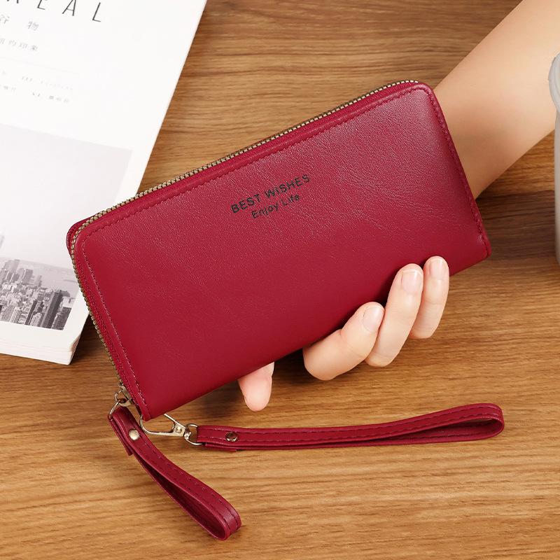 Nueva versión coreana de la billetera larga de damas, billetera de negocios de lujo ligera, moda multi-tarjeta billetera con cremallera al por mayor