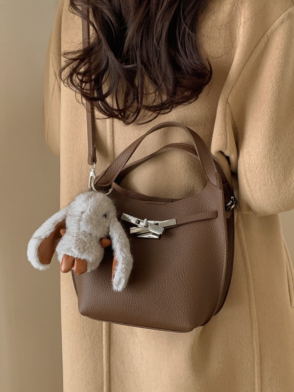 Bolso de mujer nuevo estilo coreano nicho de moda lichi bolso de cubo portátil de alta sensación de ocio mochila de viaje