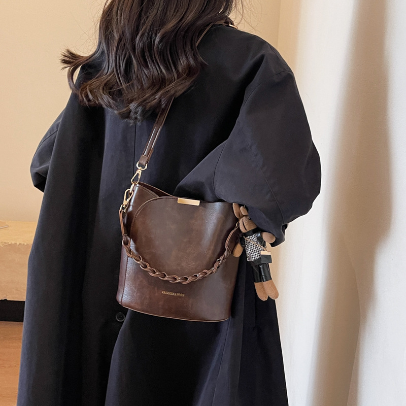 Cross-border retro nicho bolso de cubo para mujeres 2025 nuevo tipo de mochila casual de moda textura versátil bolso de hombro portátil