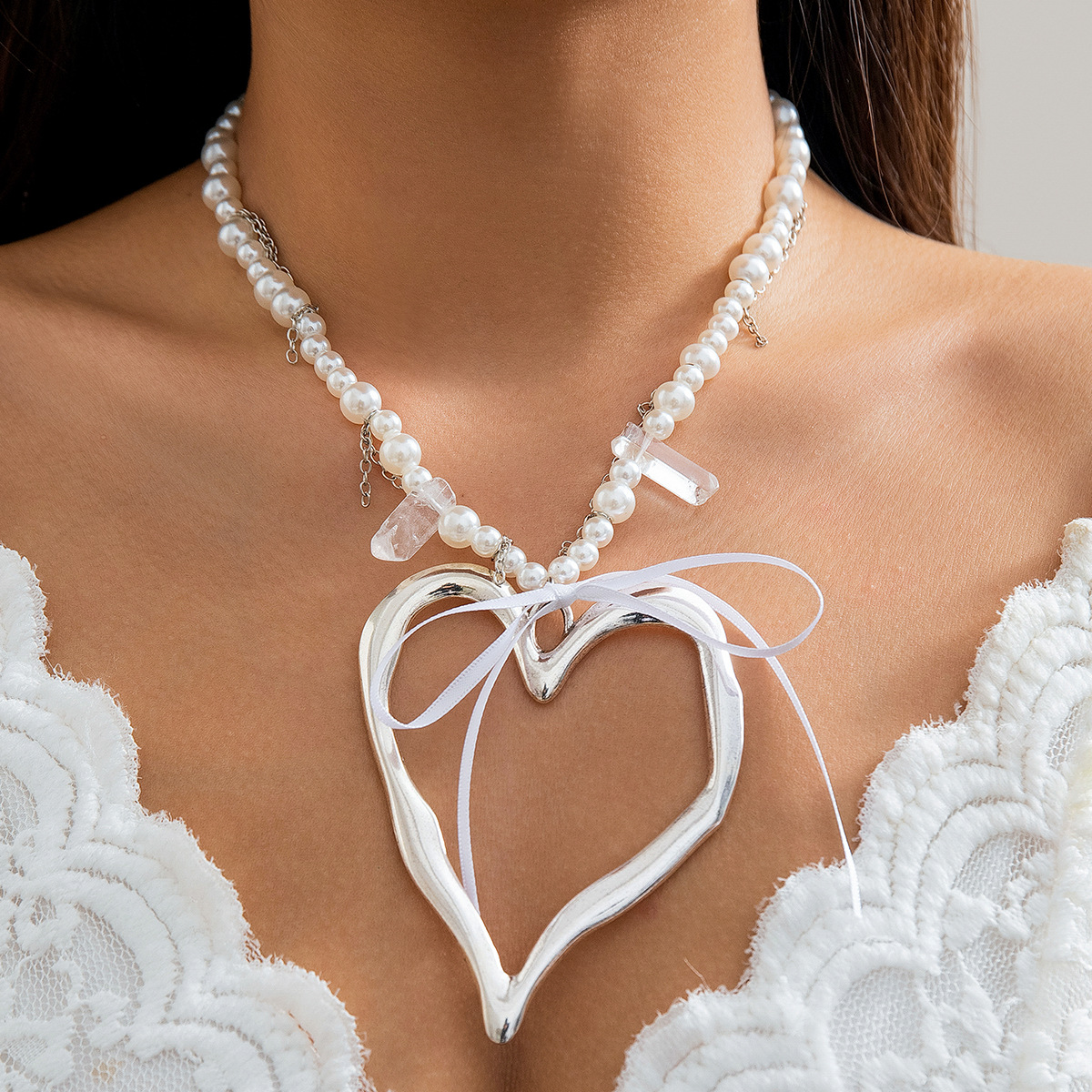 brand pendant heart shaped with bow